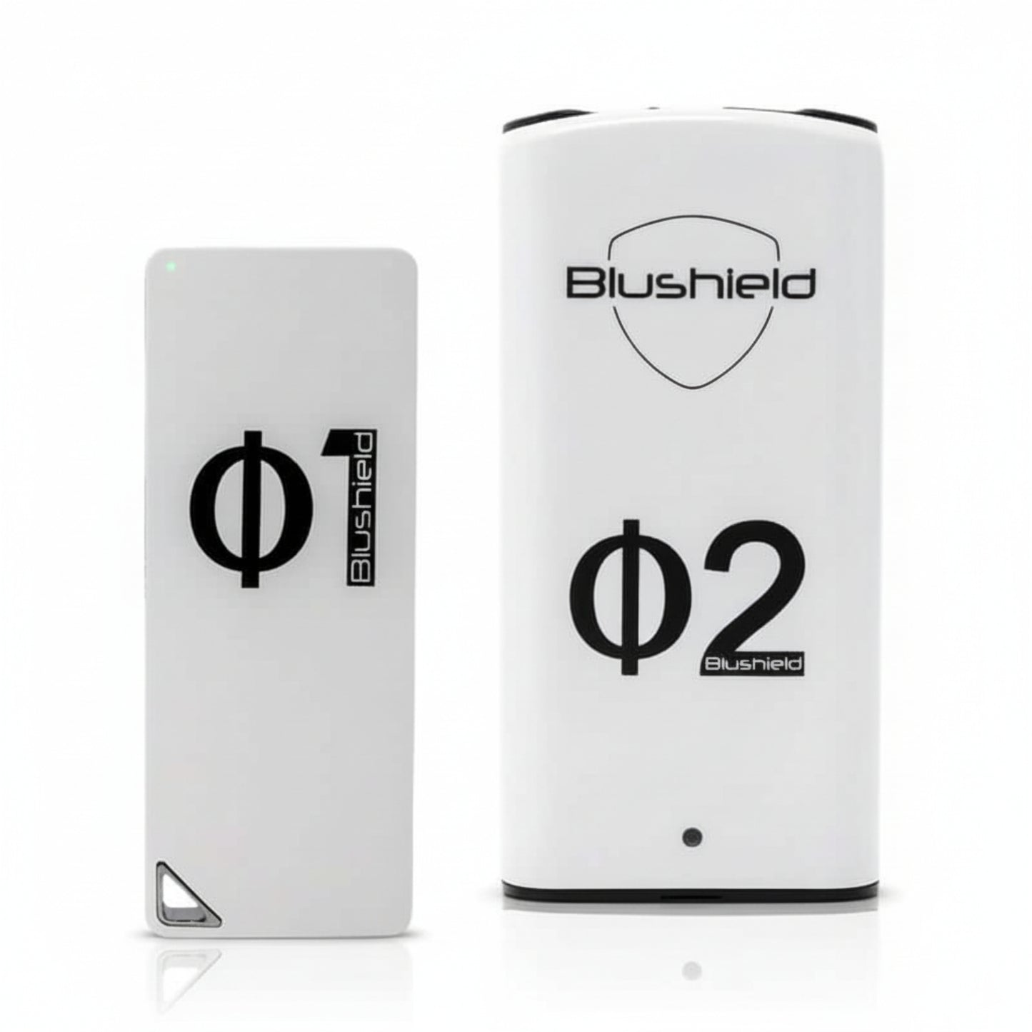 two white devices look like cell phones for EMF protection, one says Φ1 Blushield, the other says Blushield Φ2