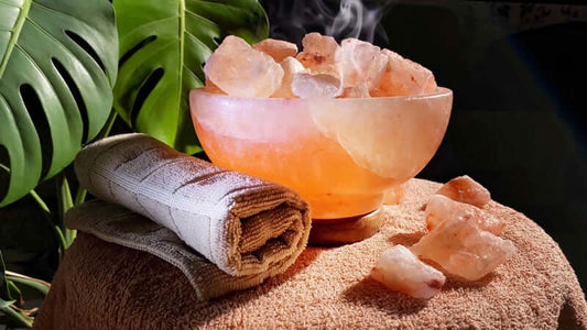 Himalayan Crystal Salt Brine Therapy with salt crystals and a towel on a soft surface.