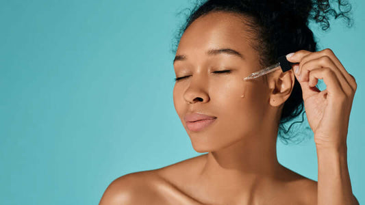 Woman applying ratite oil for skincare in Ratite Oil Reviews article.