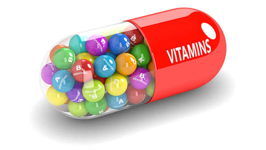 Colorful vitamins in a capsule representing Vitamins to Nourish Your Body.