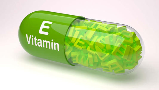 Vitamin E capsule filled with green vitamin E letters, showcasing the importance of this essential nutrient.