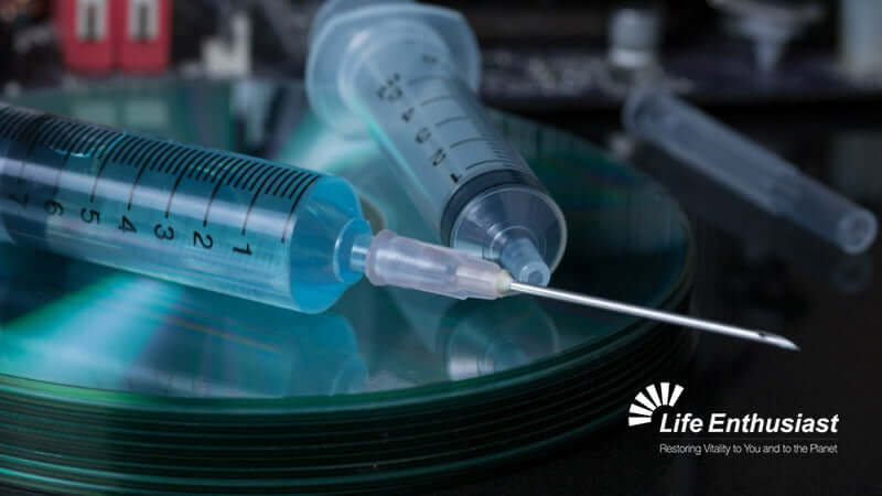 Vaccination Facts: close-up of syringes on a reflective surface, highlighting the importance of vaccination.