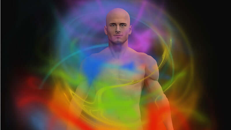 ORMUS Alchemy Today by Barry Carter with vibrant colorful energy surrounding a figure.