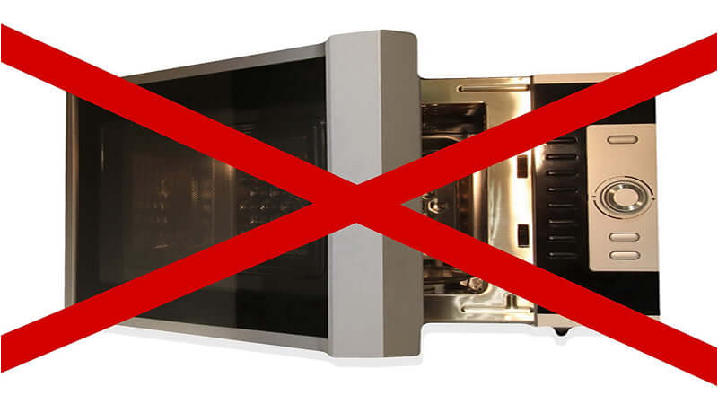 Microwaving Destroys Nutrients - an image of a microwave with a red cross over it.