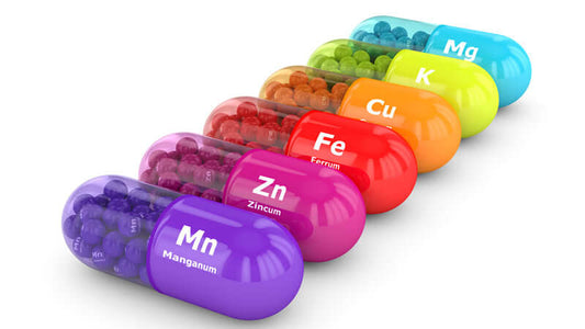 Colorful capsules containing essential minerals representing the Importance of Mineral Balancing.