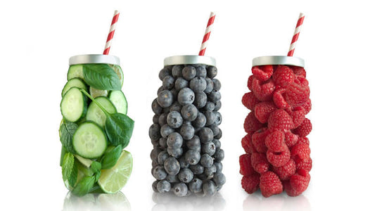 Refreshing beverages featuring cucumber, blueberries, and raspberries for the Raw Food Craze lifestyle.