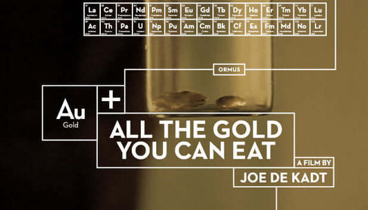 Movie All The Gold You Can Eat poster featuring gold symbols and periodic table elements.