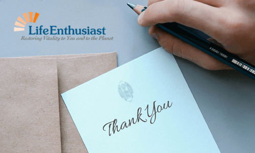 Person writing 'Thank You' note, reflecting the theme of How to Be Thankful.