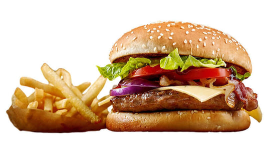 Juicy burger with lettuce, tomato, and fries, representing themes from the movie Super Size Me by Andrew Gumbel.