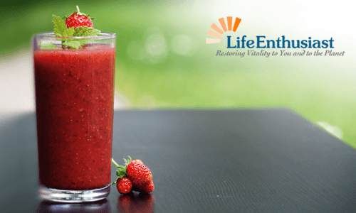 Refreshing smoothie in a glass with strawberries, perfect to help you step up your smoothie game.
