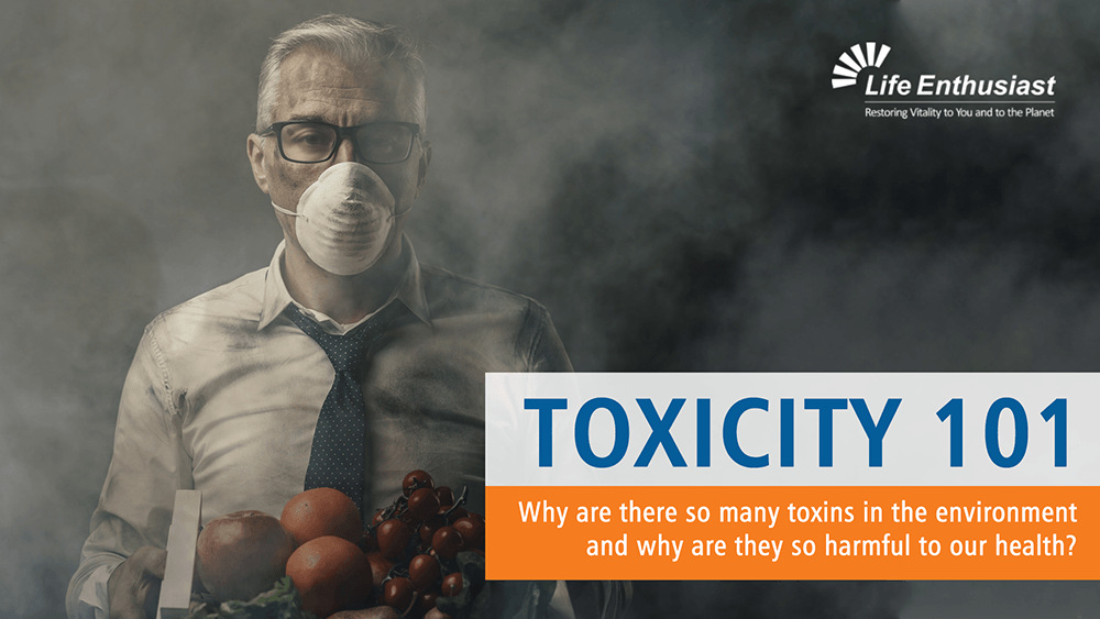 Person wearing a mask surrounded by produce, titled 'TOXICITY 101', discussing environmental toxins and health risks.