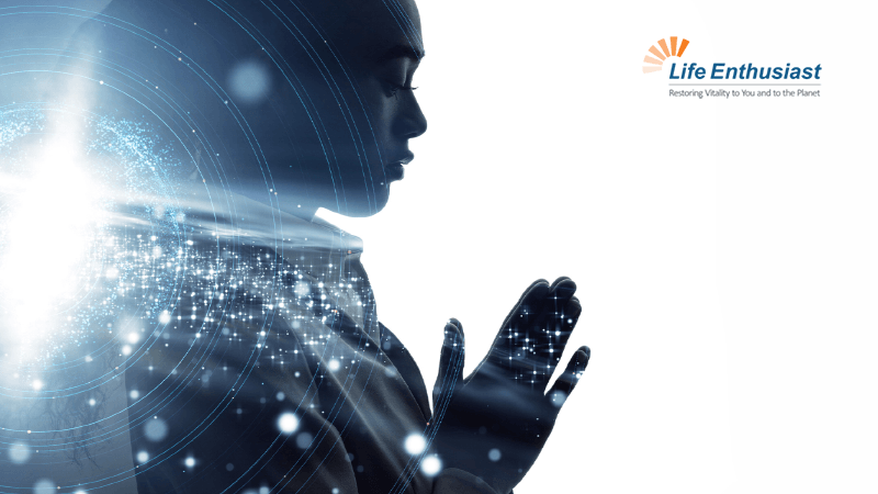 Person in meditation pose symbolizing Emotional Health and well-being, surrounded by light effects.