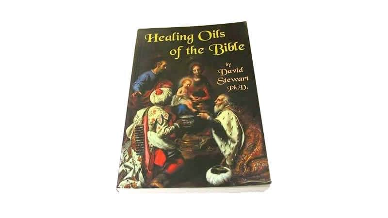 Book Healing Oils of the Bible by David Stewart, Ph.D., featuring illustrations of healing oils.