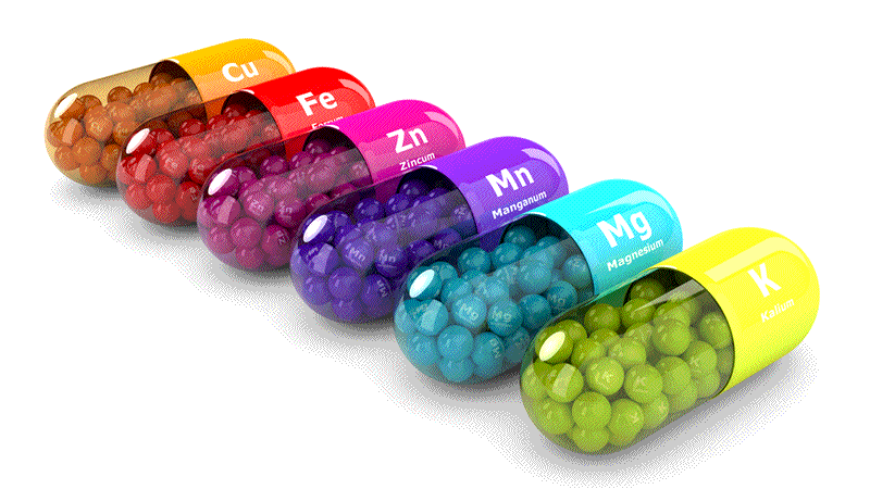 Colorful capsules containing essential minerals like Cu, Fe, Zn, Mn, Mg, and K, highlighting the importance of Minerals.
