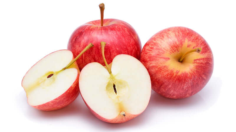 Fresh red apples with slices showcasing Apple Nutritional Information.