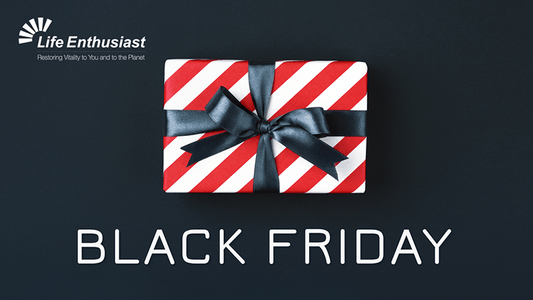 Black Friday at Life-Enthusiast.com promotional gift box with red and white stripes and a black ribbon