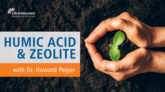 Hands holding soil with a small plant, featuring Humic Acid and Zeolite in the title.