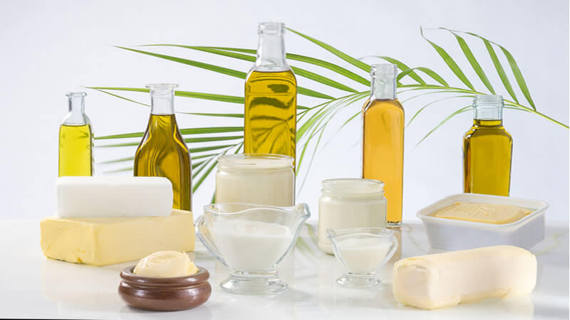 Ratite Oil's Many Uses and Functions showcased in various oils and butters on a clean white background.