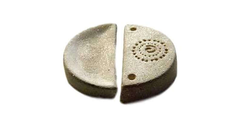 Ancient Rejuvenation Technology depicted in a unique sand-colored stone artifact showing intricate carvings.