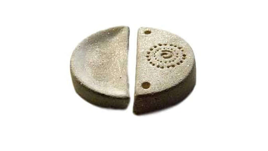 Ancient Rejuvenation Technology depicted in a unique sand-colored stone artifact showing intricate carvings.