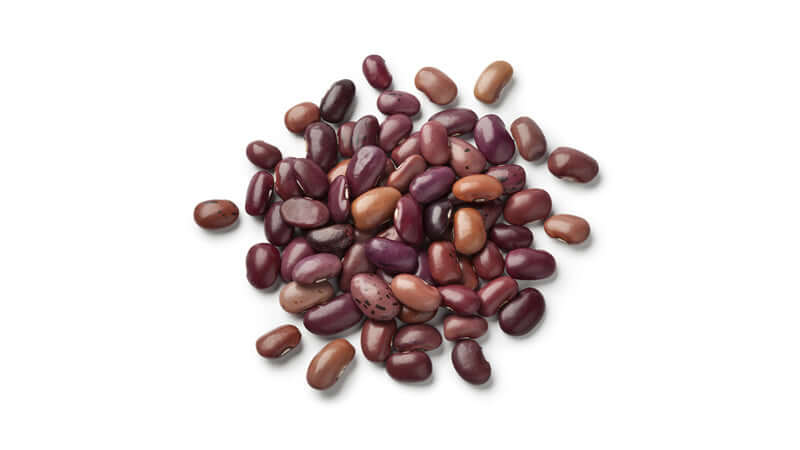 A pile of various beans illustrating their nutritional aspects and health benefits, related to Beans Health Benefits.