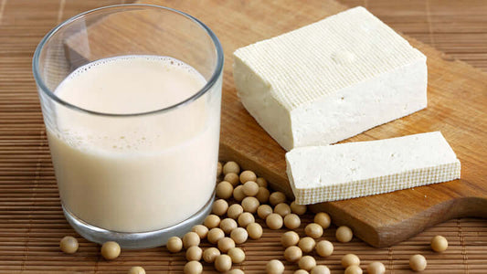 Soy milk and tofu cubes showcasing the benefits of Soy: Miracle Food.