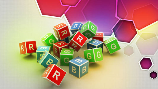 Colorful building blocks scattered, featuring letters R, G, and B, representing a playful and educational theme.