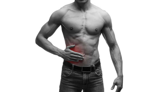 Man with visible abs indicating concern over liver health related to Liver and Weight Loss.