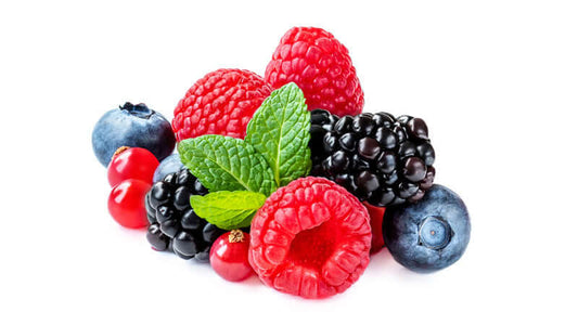 Fresh mixed berries including blackberries, blueberries, raspberries, and cranberries for health benefits.