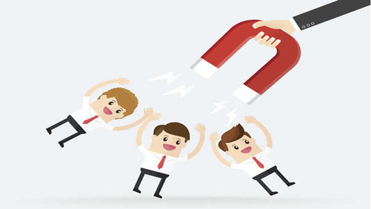 Illustration of a hand holding a magnet attracting people, representing the Health Benefits of Magnets.