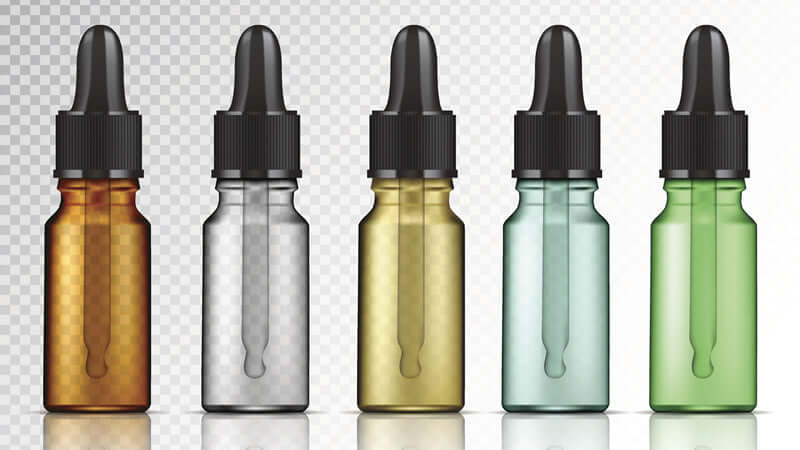 Essential Oils Introduction - an assortment of essential oil dropper bottles in various colors.