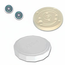 3 different round products, two stickers ADR Protect with swirling pattern, one ADR-3 ivory ceramic disk with swirling pattern, and one ADR-4 white disk