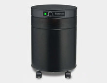 Airpura C600 air purifier for gas and odor abatement, featuring a sleek black design and movable wheels.