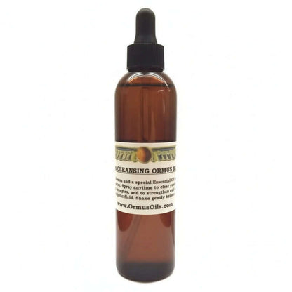 brown spray bottle of Aura Cleansing ORMUS Mist, logo of wings around a circle, special essential oils, spray anytime to strengthen energetic field, www.OrmusOils.com