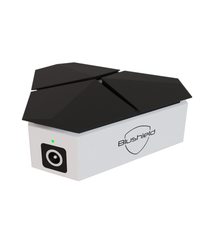 White electronic device with black top and 'Blushield' branding on a white background