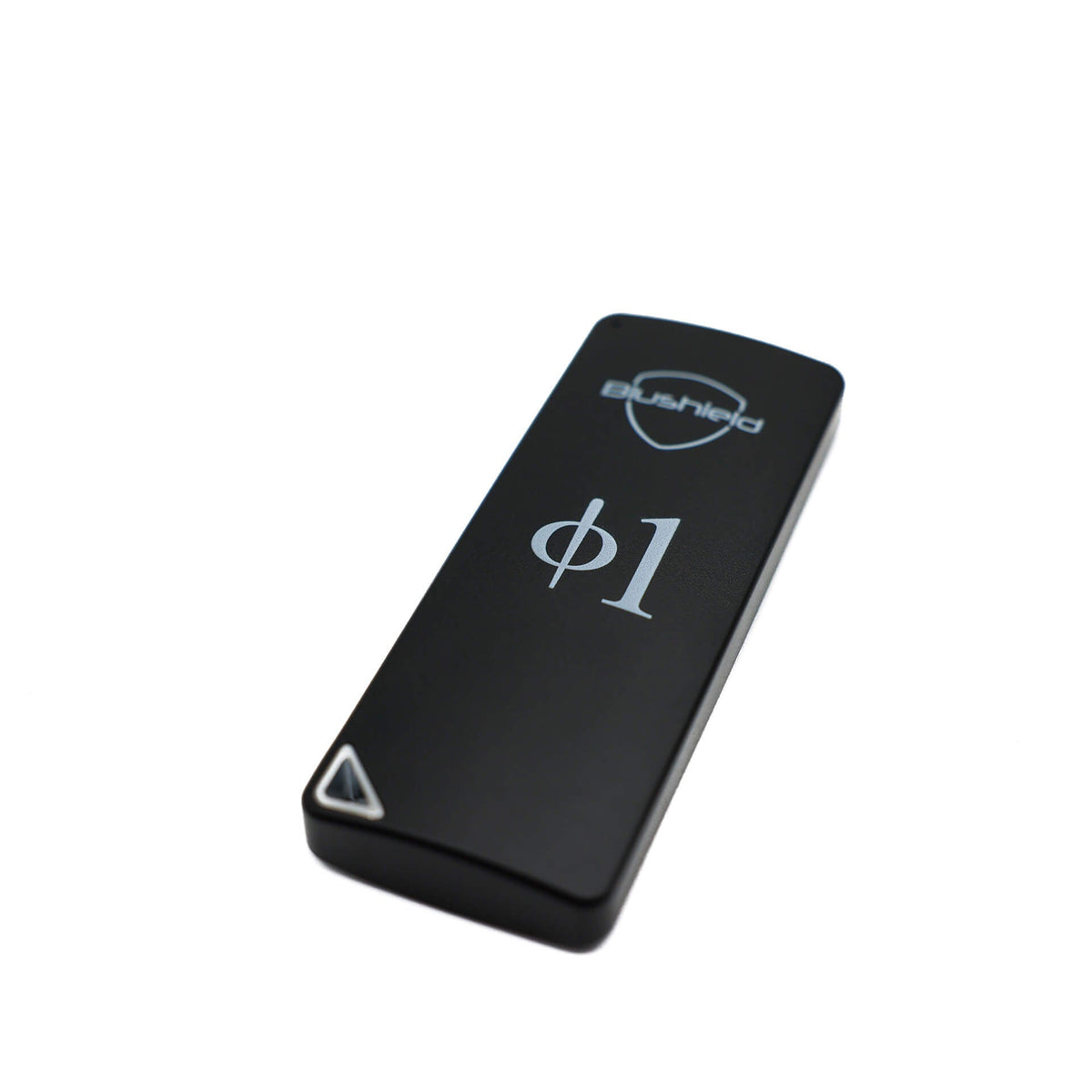 A black rectangular electronic device with rounded corners, featuring the 'bushido' brand name and shield logo, a silver phi1 symbol, and a small white triangle indicator on a plain white background.