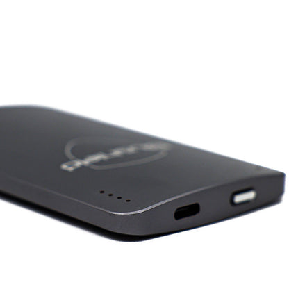 Close-up of the Ultimate Portable device showing charging ports and sleek design for personal EMF protection