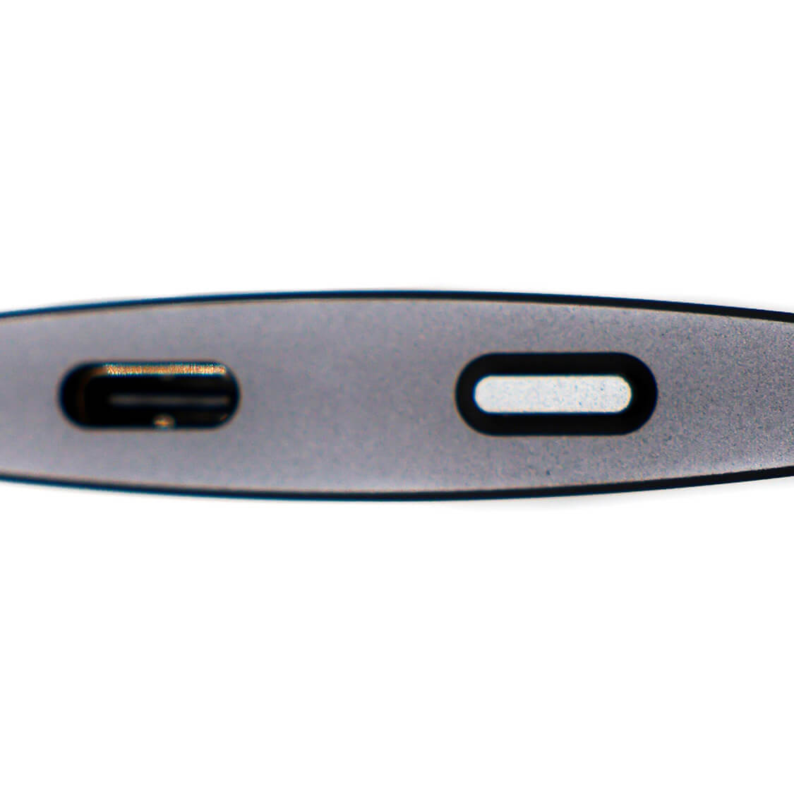 Close-up view of Ultimate Portable device indicating charging and functional ports.