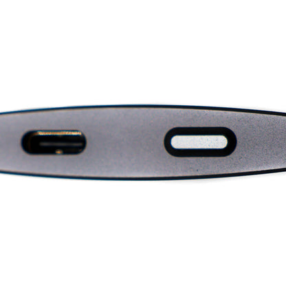 Close-up view of Ultimate Portable device indicating charging and functional ports.