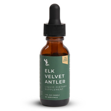 brown glass bottle of elk velvet antler supplement with dropper on a white background