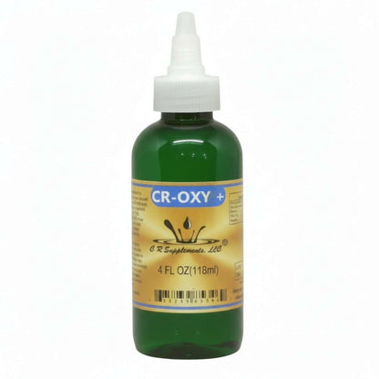 Green bottle with white cap labeled 'CR-OXY+' on a white background