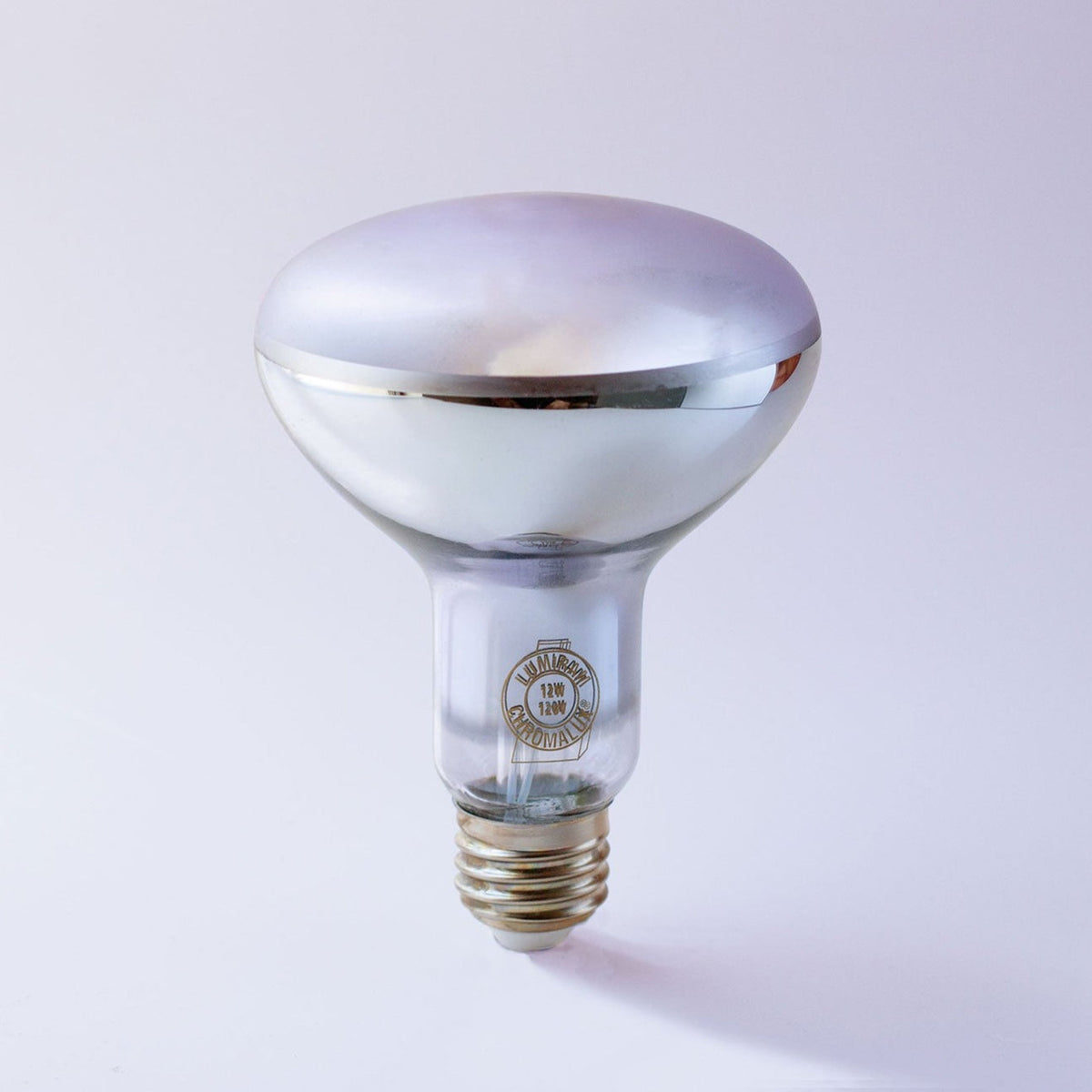 A clear glass R7S heat lamp light bulb with a metallic silver reflective dome and a gold-colored screw base, shown on a light gray background.