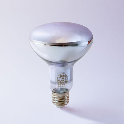 A clear glass R7S heat lamp light bulb with a metallic silver reflective dome and a gold-colored screw base, shown on a light gray background.