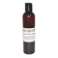 Brown bottle of Crowning Glory ORMUS with white label on a white background