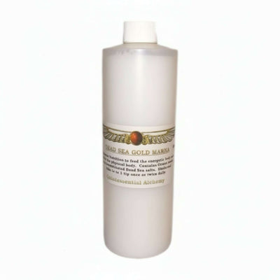 White bottle with label 'Dead Sea Gold Manna' on a white background