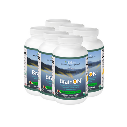 6 white containers with teal and white label with E3Live logo, AFA Fresh Frozen Superfood, BrainON with sun inside the letter O, nutrient dense AquaBotanical support for focus, clarity & balanced mood, Apple & Lemon Flavor dietary supplement, 16oz,background image of mountains and lake reflection