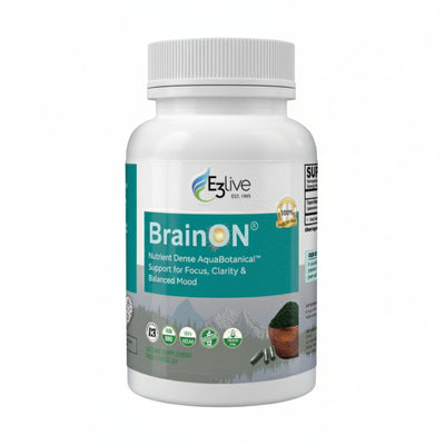 white container with teal and white label with E3Live logo, BrainON with sun inside the letter O, nutrient dense AquaBotanical support for focus, clarity & balanced mood, background image of mountains and lake reflection, with green powder and capsules in foreground