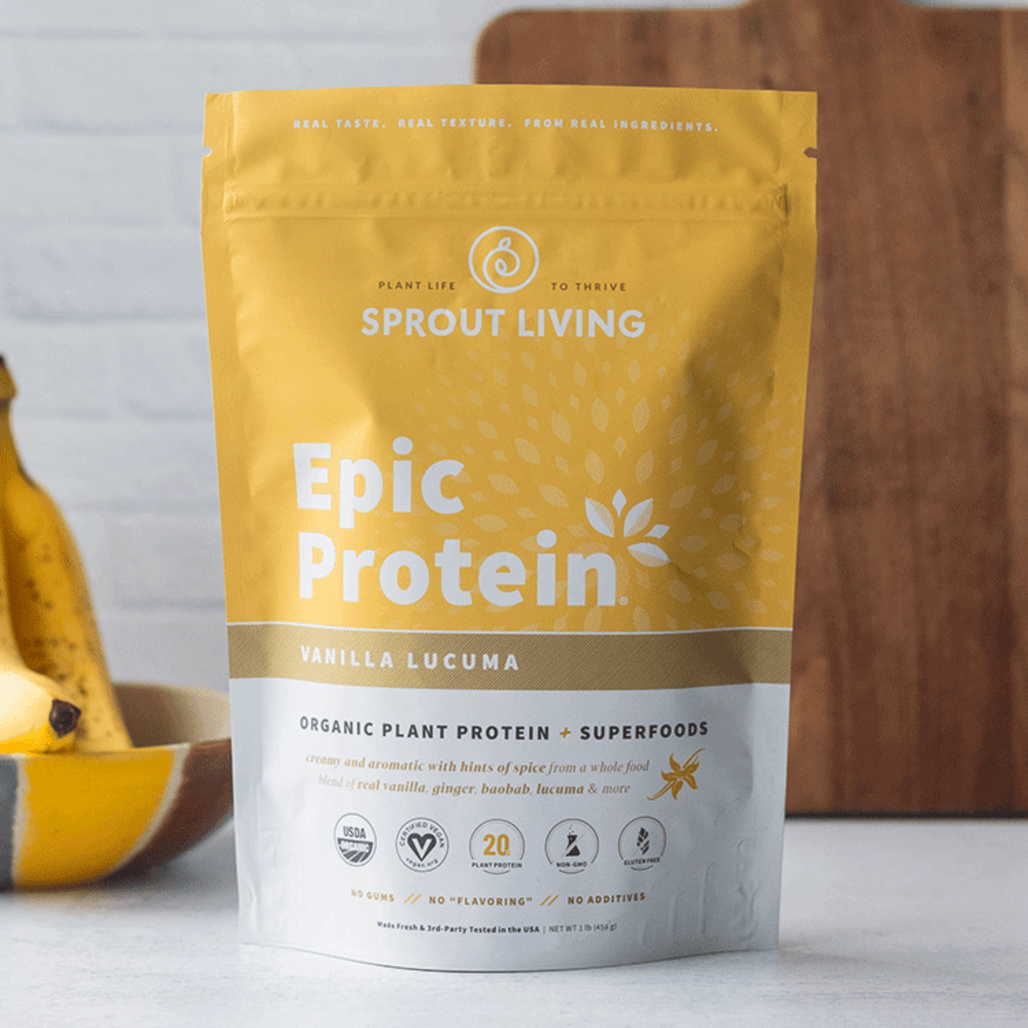 Sprout Living Epic Protein package with bananas in the background