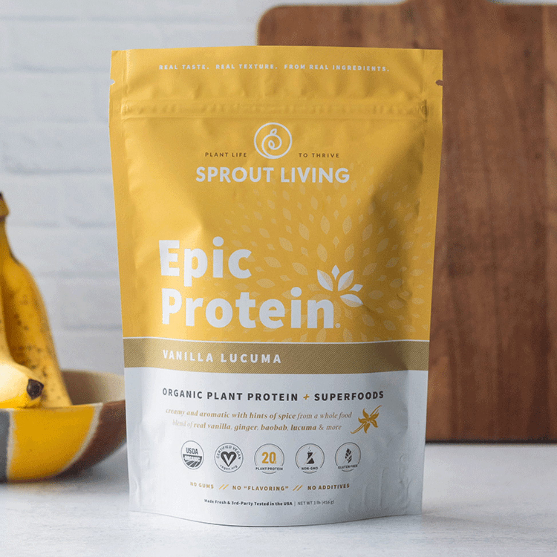 Sprout Living Epic Protein package with bananas in the background