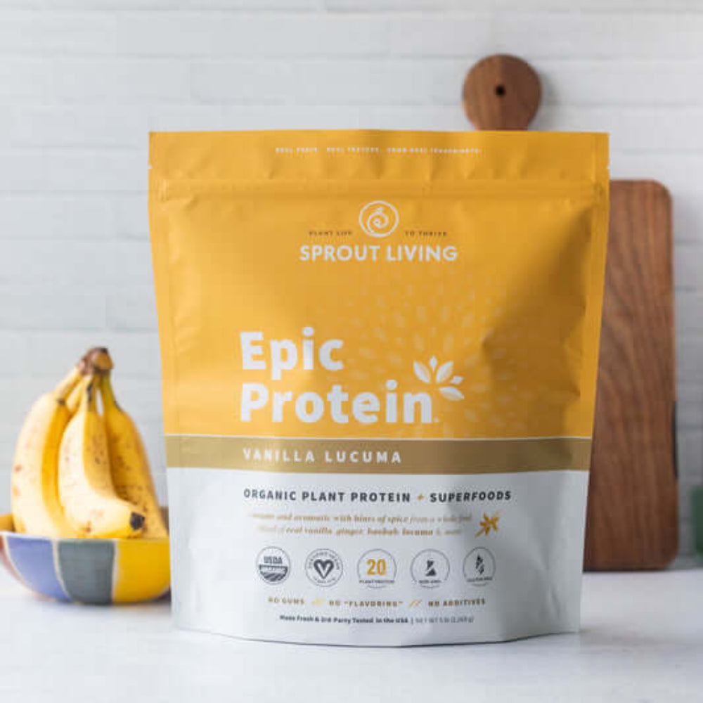 Sprout Living Epic Protein package with bananas on a white surface